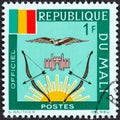 MALI - CIRCA 1964: A stamp printed in Mali shows Mali Flag and Emblems, circa 1964.