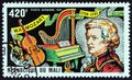 MALI - CIRCA 1981: A stamp printed in Mali from the `225th Birth anniversary of Mozart` issue shows Mozart and Musical Instruments