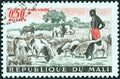 MALI - CIRCA 1961: A stamp printed in Mali shows sheep at pool, circa 1961.