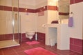 Mali Losinj, Croatia 2020.Modern bathroom detail, with a nice ceramic washbasin. Wash cabin, towels.Washb