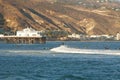 Malibu, California, USA - September 2016: Surfing people ride on the waves