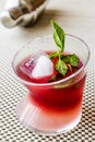 Malibu Sunset Cocktail with mint leaves. Royalty Free Stock Photo