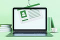 Malicious program, ransomware and cybercrime concept with user account card stolen from modern laptop screen on light green