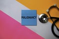 Malignancy text on sticky notes with color office desk. Healthcare/Medical concept Royalty Free Stock Photo