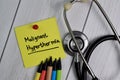 Malignant Hyperthermia text on sticky notes with office desk. Healthcare/Medical concept