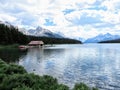 Maligne lake in Jasper national park, with calm and still waters and a handful of rowboats for tourists to rent Royalty Free Stock Photo