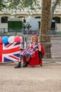 THE MALL, LONDON - 4 May 2023: Royalist outside of Buckingham Palace ahead of the Coronation of King Charles