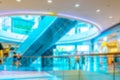 Mall people blurred background. Interior of retail centre store in soft focus. People shopping in modern commercial mall center. Royalty Free Stock Photo