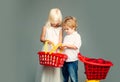 Mall shopping. Buy products. Play shop game. Cute buyer customer client hold shopping cart. Girl and boy children Royalty Free Stock Photo