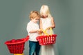 Mall shopping. Buy products. Play shop game. Cute buyer customer client hold shopping cart. Girl and boy children Royalty Free Stock Photo