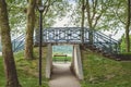 Mall stone bridge in a garden with the Montparnasse tower in the background Royalty Free Stock Photo