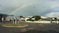 Mallaig, United Kingdom - 16 OCTOBER 2019 : View at roundabout in the town with rainbow in background.