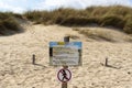 Sign prohibiting access to the regeneration sand dune reserve