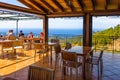 Tables in restaurant overlooking the bay of Port de Soller on the west coast of Majorca. Spain Royalty Free Stock Photo