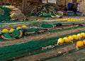 Mallorcan fisherman mending nets and repairing fishing lines in the harbor of Cala Figuera on Mallorca Royalty Free Stock Photo