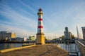 Malmo, Sweden: Beautiful white lighthouse with red stripes. City in Scania county and Oresund region