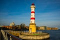 Malmo, Sweden: Beautiful white lighthouse with red stripes. City in Scania county and Oresund region