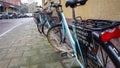 MalmÃÂ¶, Sweden - February 1, 2020: The staff of the elder care in MalmÃÂ¶ don`t use cars, but blue bikes, to get to their patients Royalty Free Stock Photo