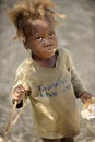 A Malnourished Haitian Girl Eating Royalty Free Stock Photo