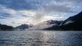 Maloja mountain Pass, Switzerland. Landscape of the lake Sils in the morning during the fall time. The fog covers the lake Royalty Free Stock Photo