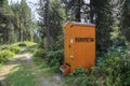 Mobile compost toilet at a hiking roadside.