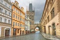 Malostranska tower and old buildings in Prague