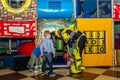 Children`s birthday celebration in the gaming complex. Group of kids having fun at playground. Royalty Free Stock Photo