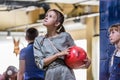 A girl holding bowling ball and going to throw it. Children having fun.