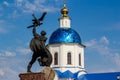 Maloyaroslavets, Russia - June 2019: View of the monument to Vladimir the Brave and the dome of the Kazanskiy Cathedral