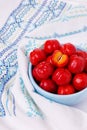 Malpighia glabra (red acerola), tropical fruit in bowl Royalty Free Stock Photo