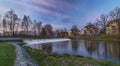 Malse river with big weir before sunrise in Budweis city Royalty Free Stock Photo