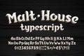 Malt House alphabet font. Vintage shabby letters, numbers and symbols. Wooden background. Royalty Free Stock Photo