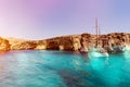 Malta Blue Lagoon and mountainous coast beauty water and boat