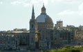 Malta, GÃÂ¼ira, Manoel Island, view of the dome and Carmelite Church bell tower from the island Royalty Free Stock Photo