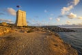 Malta - Ghajn Tuffieha watchtower at Golden Bay before sunset