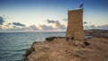 Malta - Ghajn Tuffieha watchtower at Golden Bay before sunset Royalty Free Stock Photo