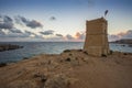 Malta - Ghajn Tuffieha watchtower at Golden Bay before sunset Royalty Free Stock Photo