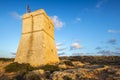 Malta - Ghajn Tuffieha watchtower at Golden Bay before sunset Royalty Free Stock Photo