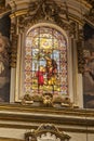 Stained glass window above the main altar floor in St Paul`s Cathedral Mdina Malta