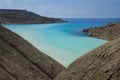 Malta nature, cliffs in malta, Ramla Bay in Malta, maltese landscape with the hill and different blue colour sea on sunny day, sce Royalty Free Stock Photo