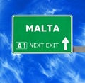 MALTA road sign against clear blue sky