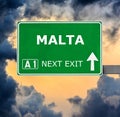 MALTA road sign against clear blue sky