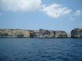 Malta sea scenery of steep coast made of limestone with plenty of caves Royalty Free Stock Photo