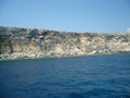 Malta shore steep coastal line with visible geomorphological layers of limestone Royalty Free Stock Photo