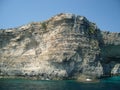 Malta shore steep limestone slopes with geomorphological layers Royalty Free Stock Photo