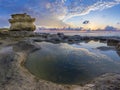 Malta - Sunrise at St.Peter`s Pool with huge rocks of Delimara Royalty Free Stock Photo