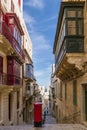 Malta, Typical narrow streets with colorful balconies in Valletta , Malta Royalty Free Stock Photo