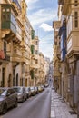 Malta, Typical narrow streets with colorful balconies in Valletta , Malta Royalty Free Stock Photo