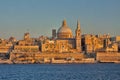 Malta - Valetta - Valetta`s cityscape at dusk with harbor waterf