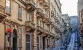 Malta, Valletta, building facade with balconies, perspective view Royalty Free Stock Photo